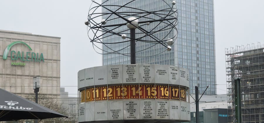 World time clock showing cities and hours